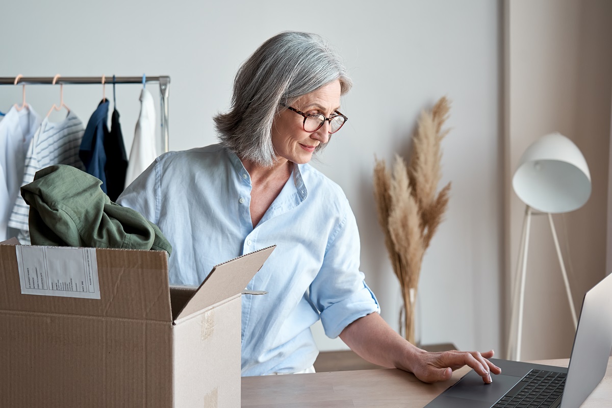 a seller packing items in boxes