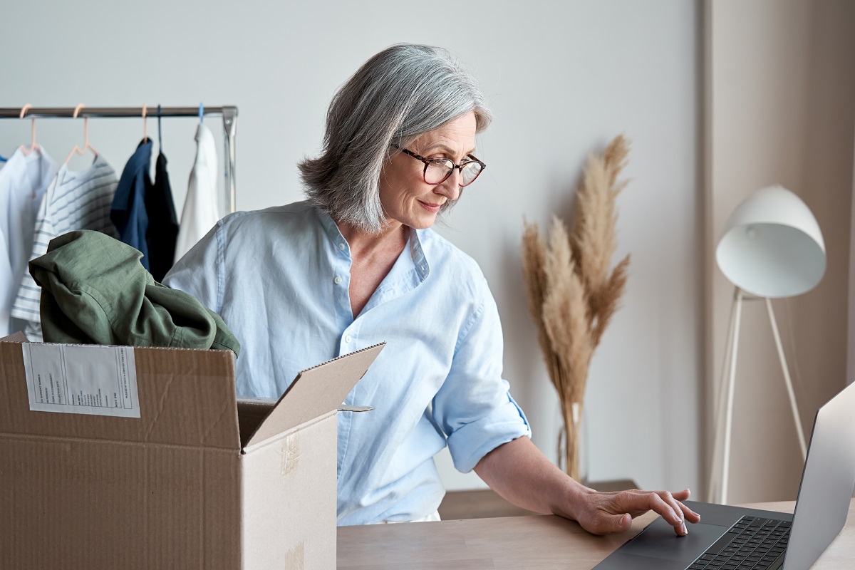 a seller packing items in boxes